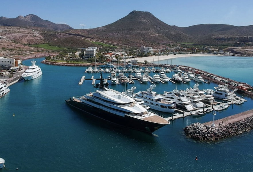 Costa Baja marina dock in La Paz, Mexico, surrounded by water and the beach club on the back.