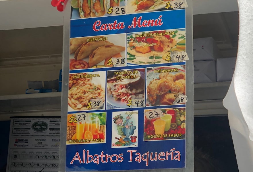 Fish tacos Albatros' menu with images and prices in it, La Paz, Mexico.