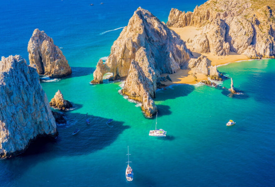 Few sailboats around The Arc (or Land's End) in Cabo San Lucas, Mexico.