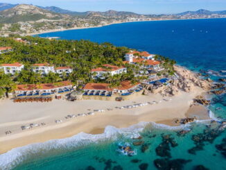 One & Only Palmilla resort with white sand, turquoise waters, and palm trees overlooked from above