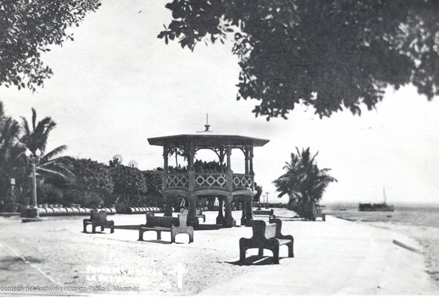 La Paz Mexico Malecon kiosk in the 1920s in a black and white old image of the first public seats and sidewalks ever built.