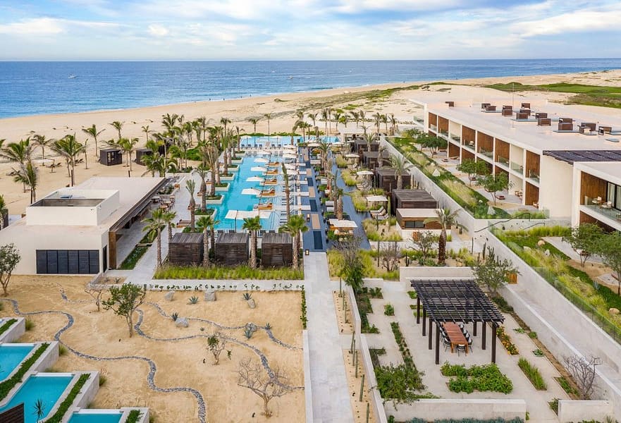 Nobu Hotel aerial shoot overlooking the ocean, palm trees and pool next to the beach, Los Cabos, Mexico.