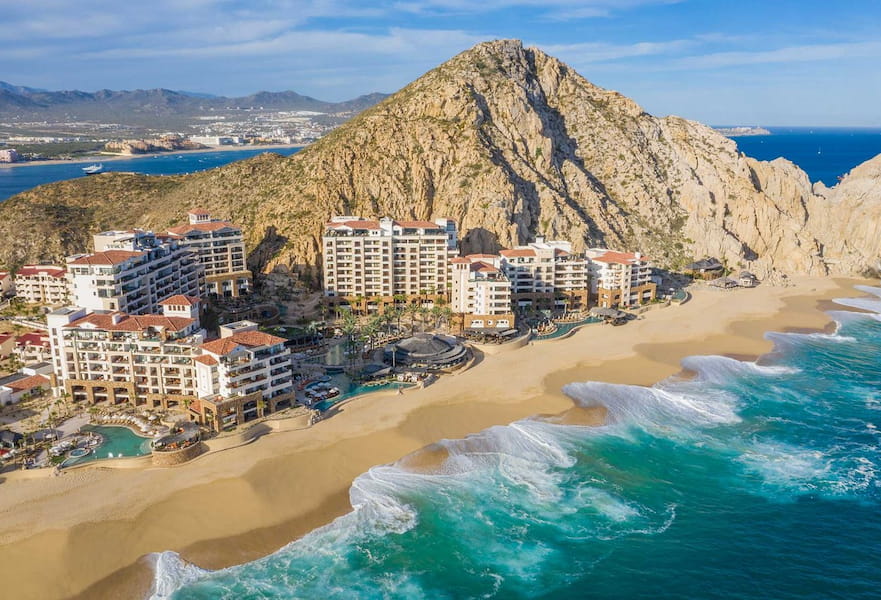 Aerial view of hotel Solmar, blue ocean and big cliff on the back, Los Cabos, Mexico.