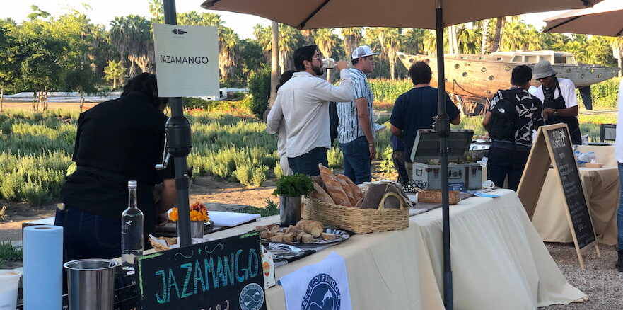 Jazamango stand offering food and drinks at Gastrovino Festival in Todos Santos BCS
