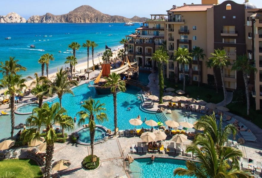 Beachfront poolside aerial view at Villa Del Arco Resort in Cabo San Lucas Mexico