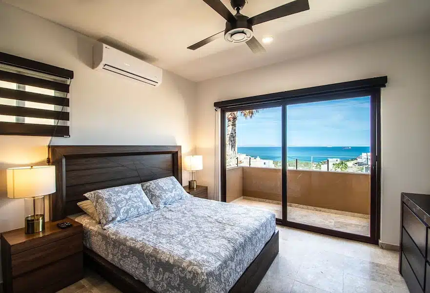 Luxury bedroom with ocean view at La Roqueta condos in La Paz, Mexico