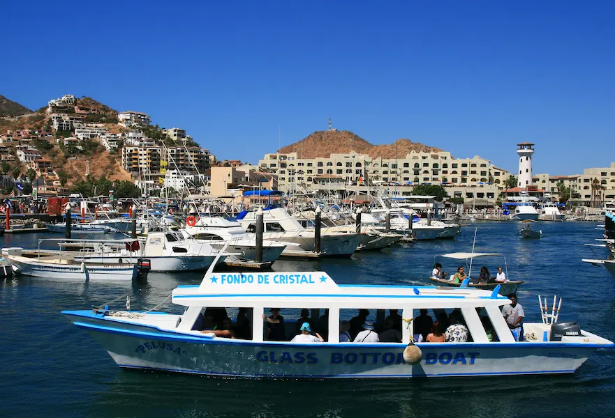 A boat in the Cabo San Lucas marina, ready to start a tour